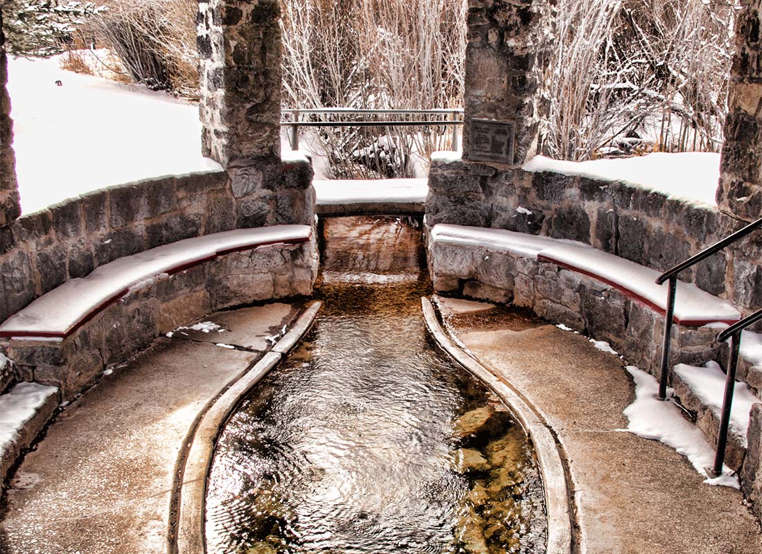 Soda Springs, ID - View Inside a Stone Building with a Natural Spring in the Middle on a Snowy Day in Soda Springs Idaho